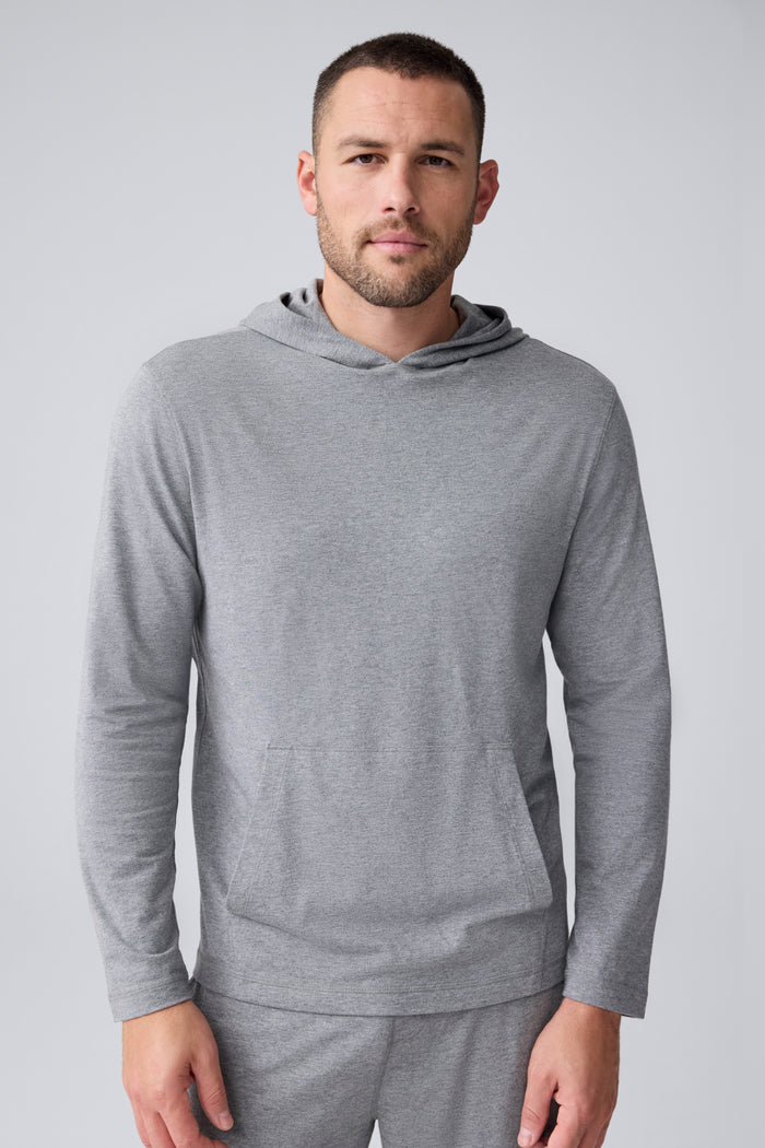 Front view of a man wearing 18-Hour Jersey Hoodie in Medium Grey Heather