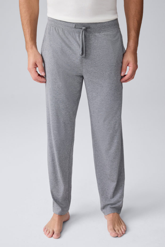 Front view of a man wearing 18 hour Jersey pant in Medium Grey Heather