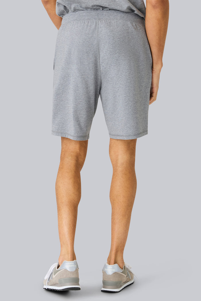 Back view of a man wearing 18hour Jersey Short in Grey Heather