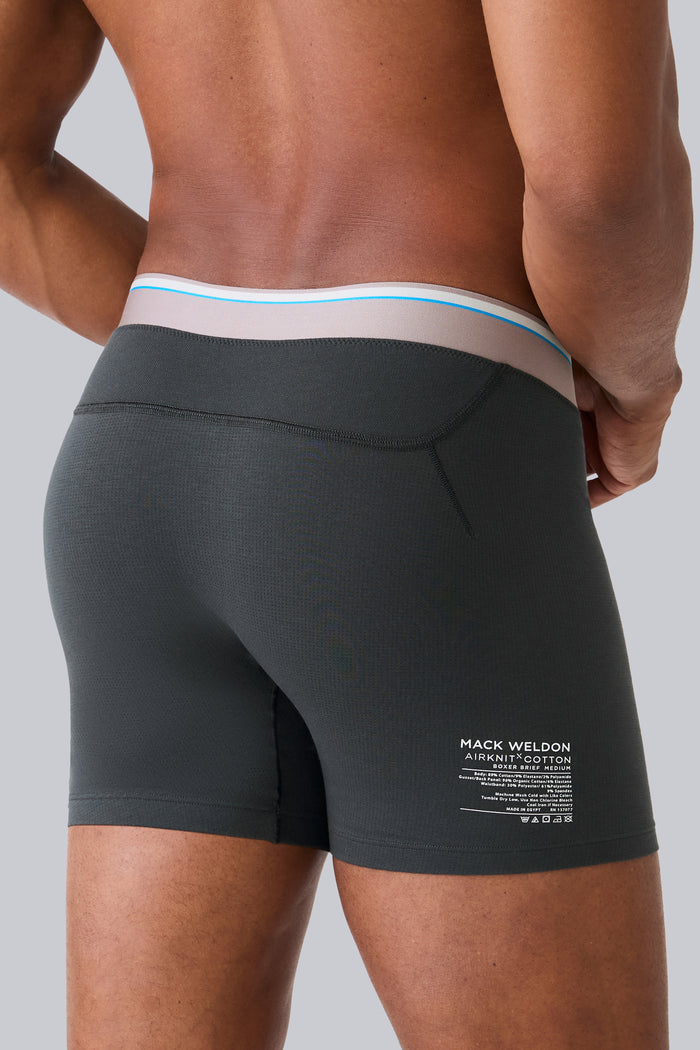 Back view of a man wearing Airknitx Cotton Boxer Brief w/ fly in Phantom