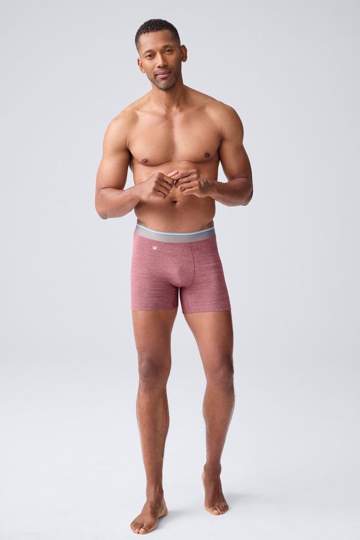 Full front view of a man wearing Airknitx Boxer brief in Aged Port Heather