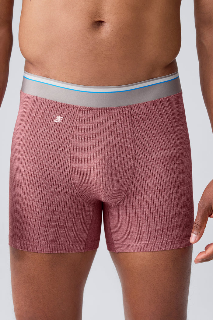 Front view of a man wearing Airknitx Boxer brief in Aged Port Heather