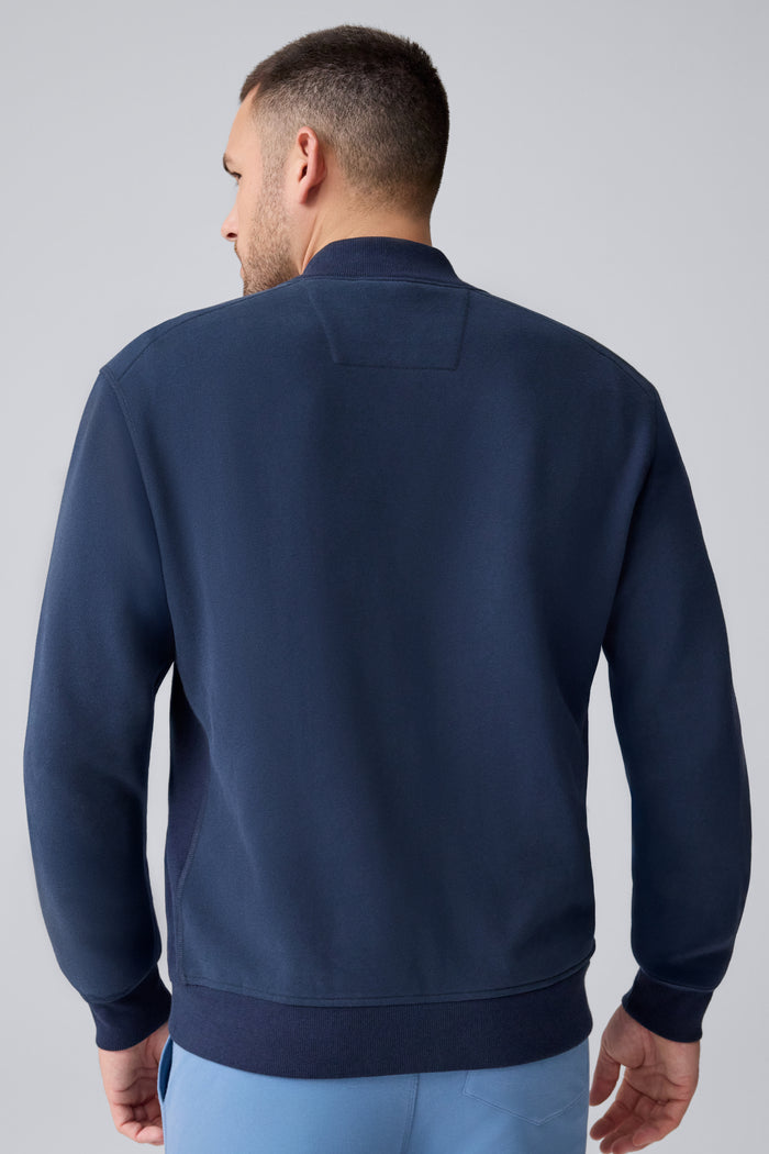 Back view of a man wearing Ace Bomber Jacket in Total Eclipse