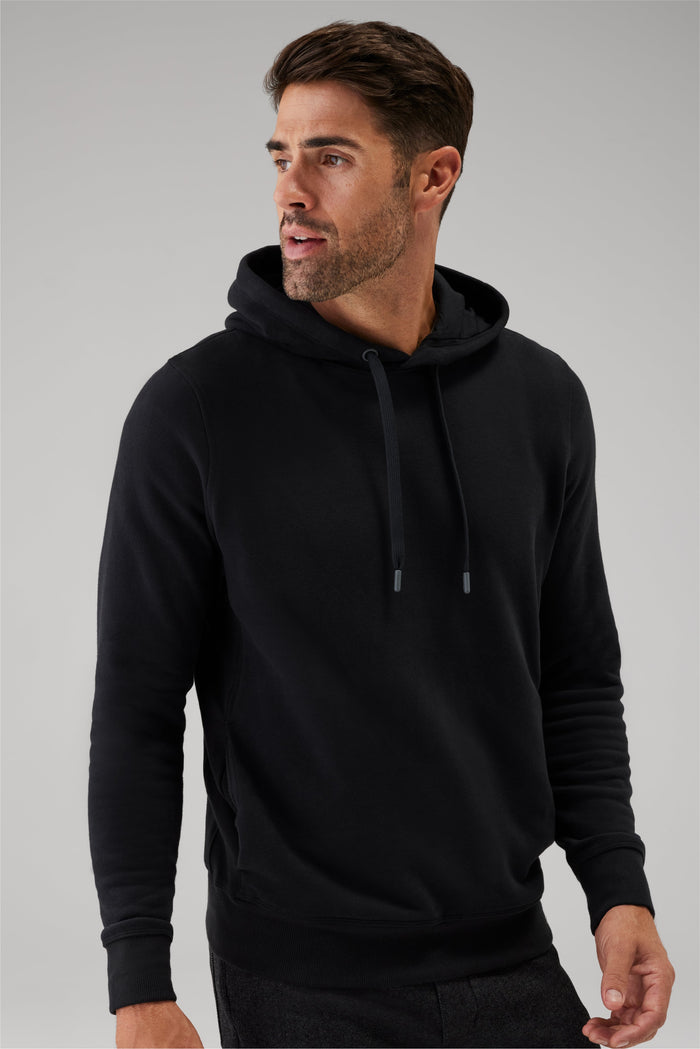 Front view of a man wearing Ace Pullover Hooded Sweatshirt