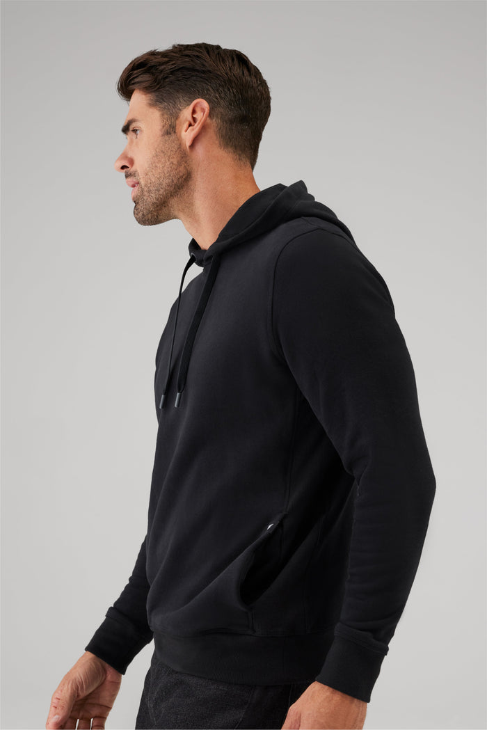 Side view of a man wearing Ace Pullover Hooded Sweatshirt