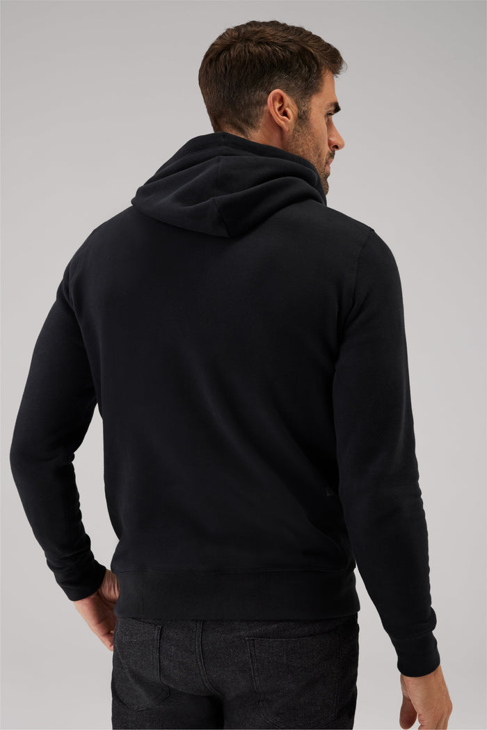 Back view of a man wearing Ace Pullover Hooded Sweatshirt