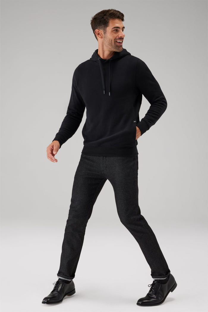 Zoomed out front view of a man wearing Ace Pullover Hooded Sweatshirt