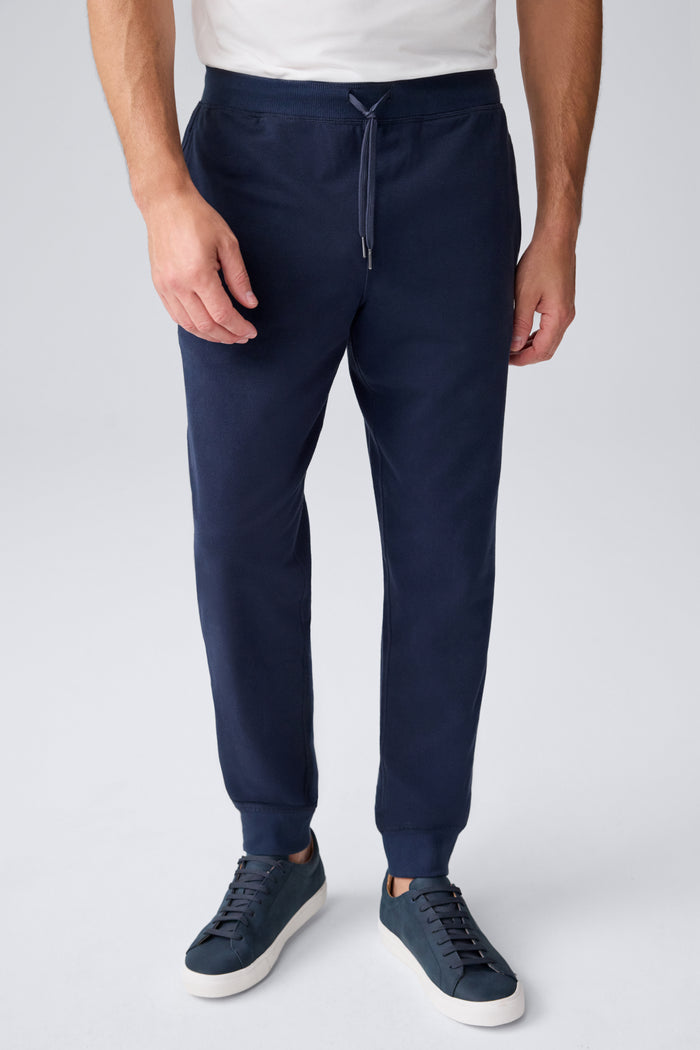 Front view of a man wearing Ace Relaxed Sweatpant in Total Eclipse