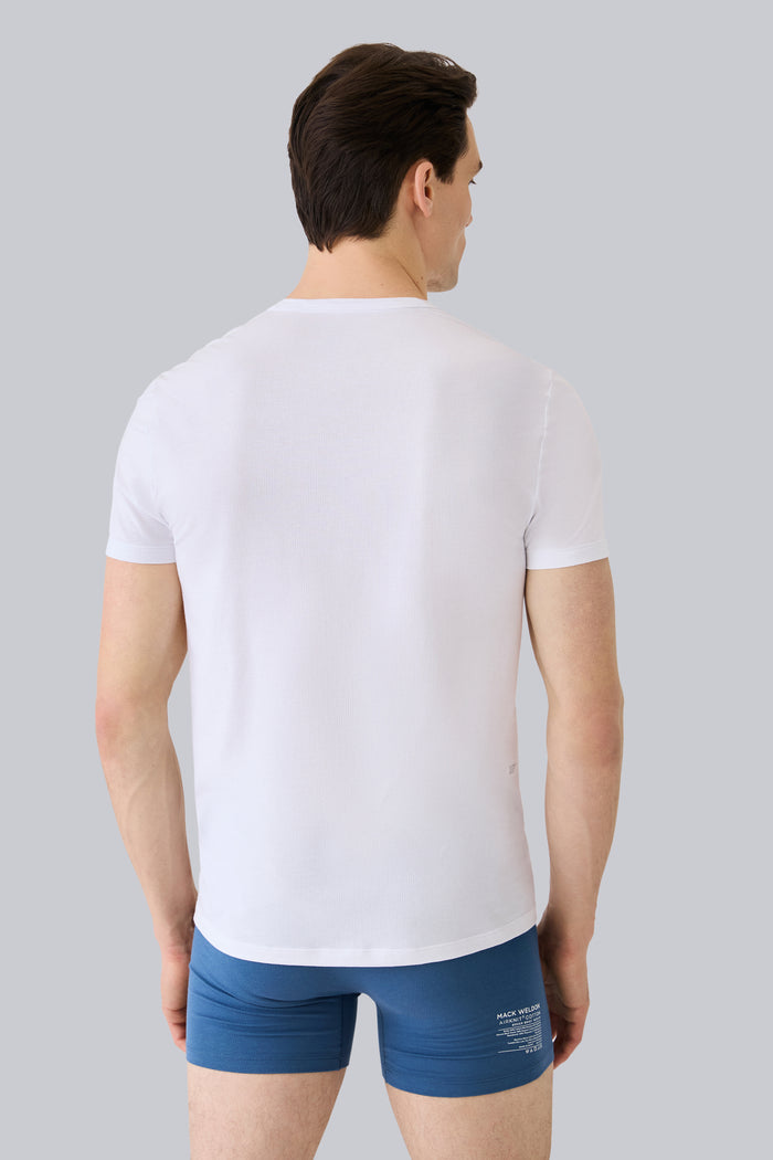 Back view of a man wearing AIRKNITx Cotton V-Neck Undershirt in Bright White
