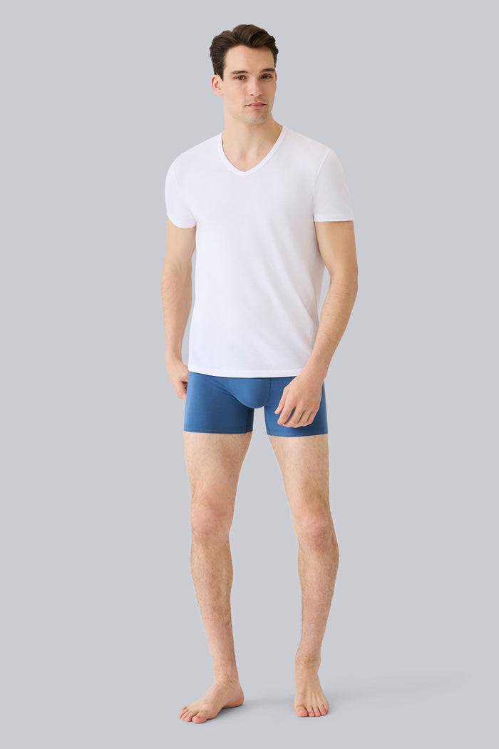 Full front view of a man wearing AIRKNITx Cotton V-Neck Undershirt in Bright White
