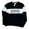 A color block varsity sweatshirt with 'JACKSON HOLE' text on the front, consisting of a black and white panel.