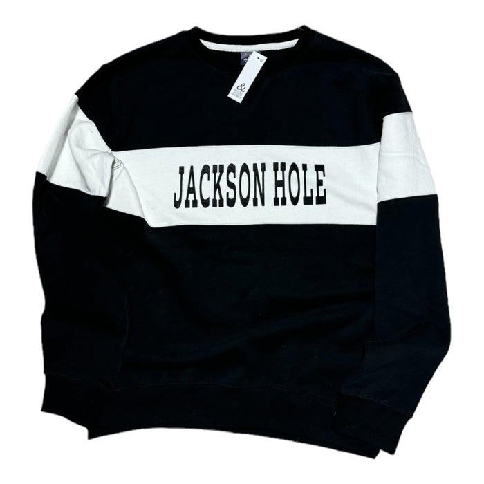 A color block varsity sweatshirt with 'JACKSON HOLE' text on the front, consisting of a black and white panel.