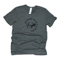 A gray t-shirt with a front graphic print of a bison and the text 'JACKSON HOLE WYOMING'.