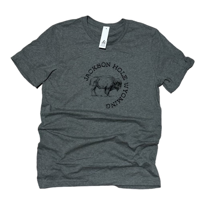 A gray t-shirt with a front graphic print of a bison and the text 'JACKSON HOLE WYOMING'.