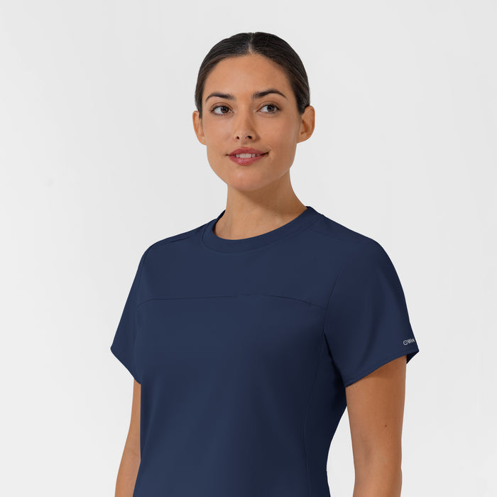 AURA Women's Captivate Crew Neck Tuck-in Scrub Top - Navy neckline