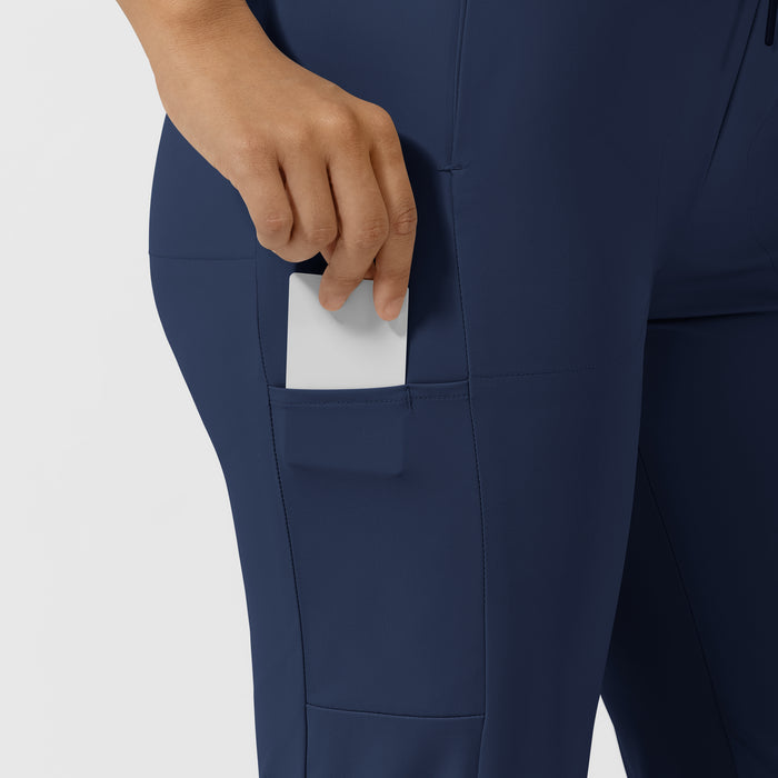 AURA Women's Glide Tapered Scrub Pant - Navy pocket with pen slot