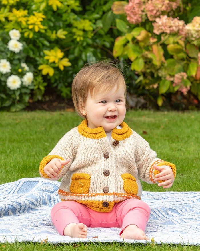 orange_cardigan_1_7f54dd2e-db1f-4001-8c07-fd181f5a8e5d.jpg
