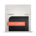 Camber Coffee Big Joy Espresso bag with a coral label across a black rounded panel