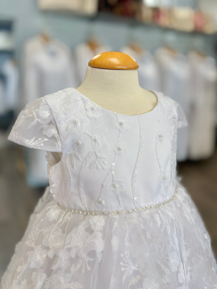 White baby dress with lace.