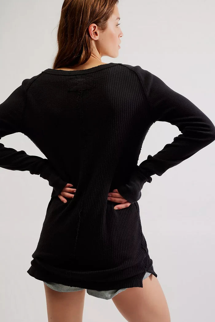 Woman wearing free people black crew back view