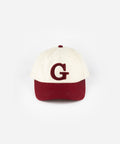 A burgundy baseball cap with the letter 'G' on a white background #color_burgundy