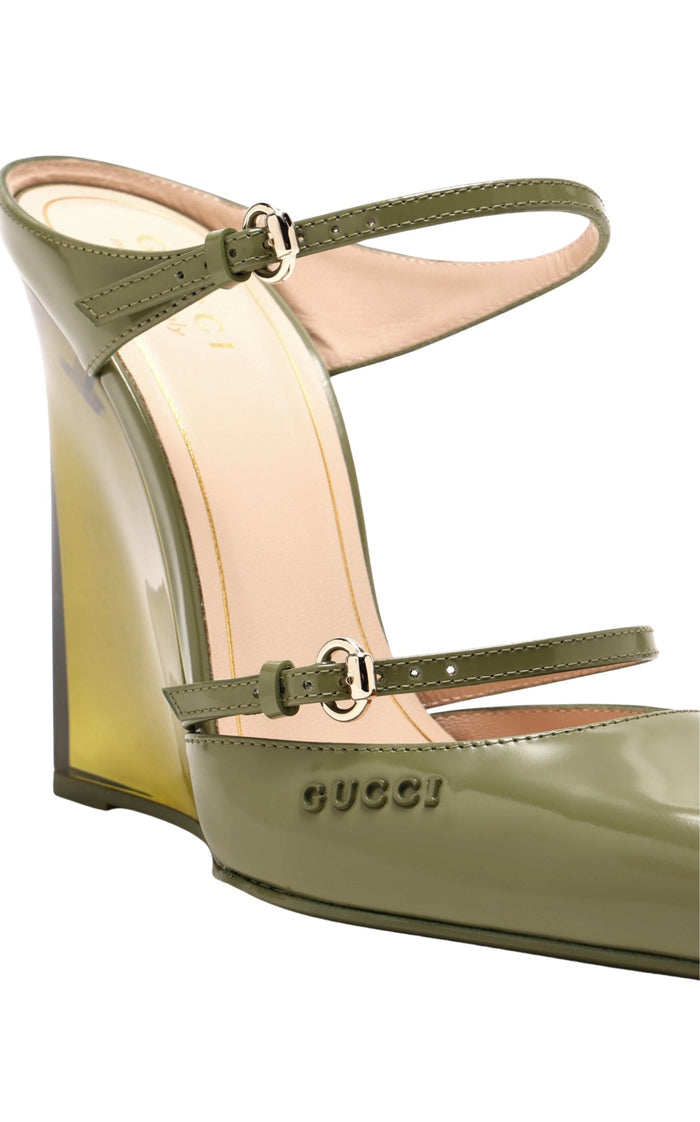 Gucci’s Christy 110 wedge mules in green