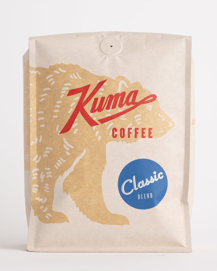 Kuma Coffee Classic Blend bag with bold red logo and blue Classic Blend badge