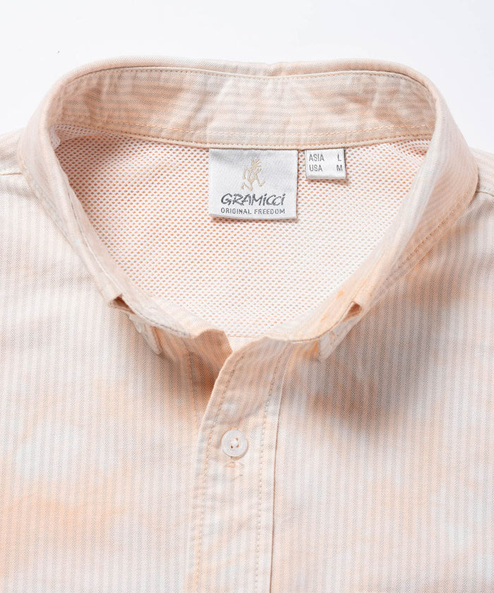 Gramicci peach Bleach Stripe colored Classic Oxford Bleached Shirt collar detail against a light-tone background.