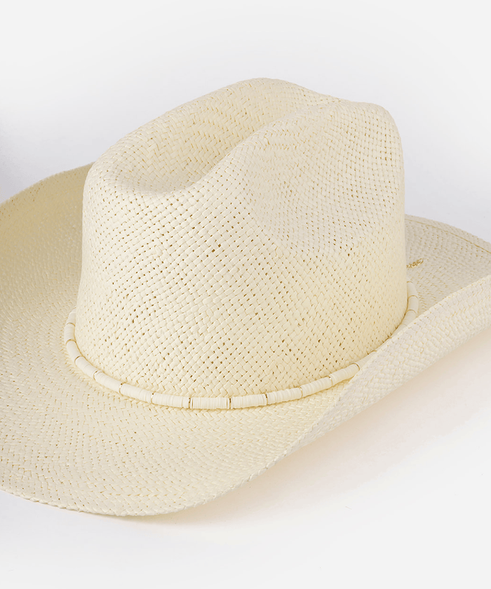Beige straw hat with a decorative band in a white background #color_cream