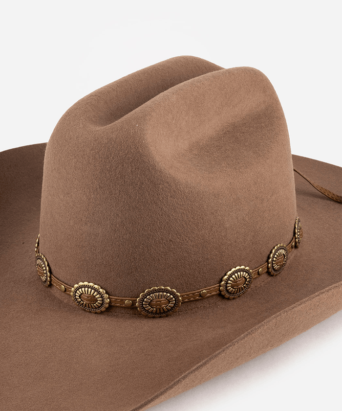 Brown cowboy hat with decorative band on a white background #color_chocolate