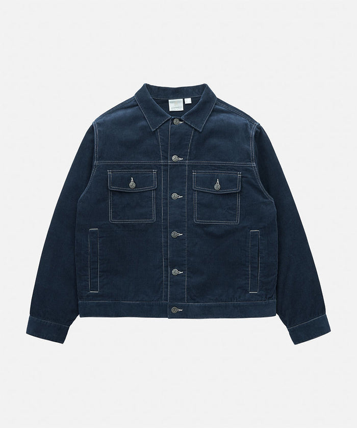 Gramicci Navy Corduroy Trucker Jacket against a light-tone background.