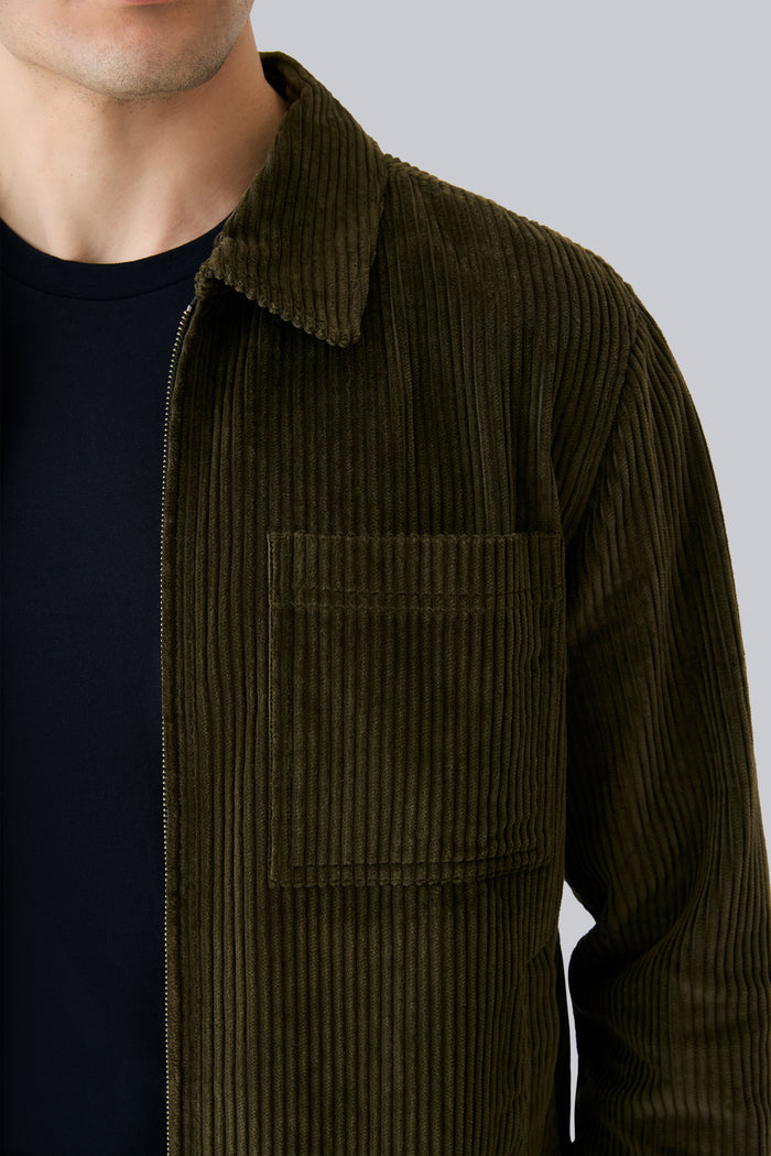 Front pocket of Corduroy Zip Jacket in Dark Olive
