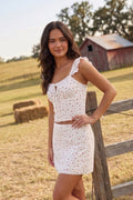 Cream floral tie-front crop top with ruffle straps, perfect for country concert outfits, rodeo fashion, and summer western style.