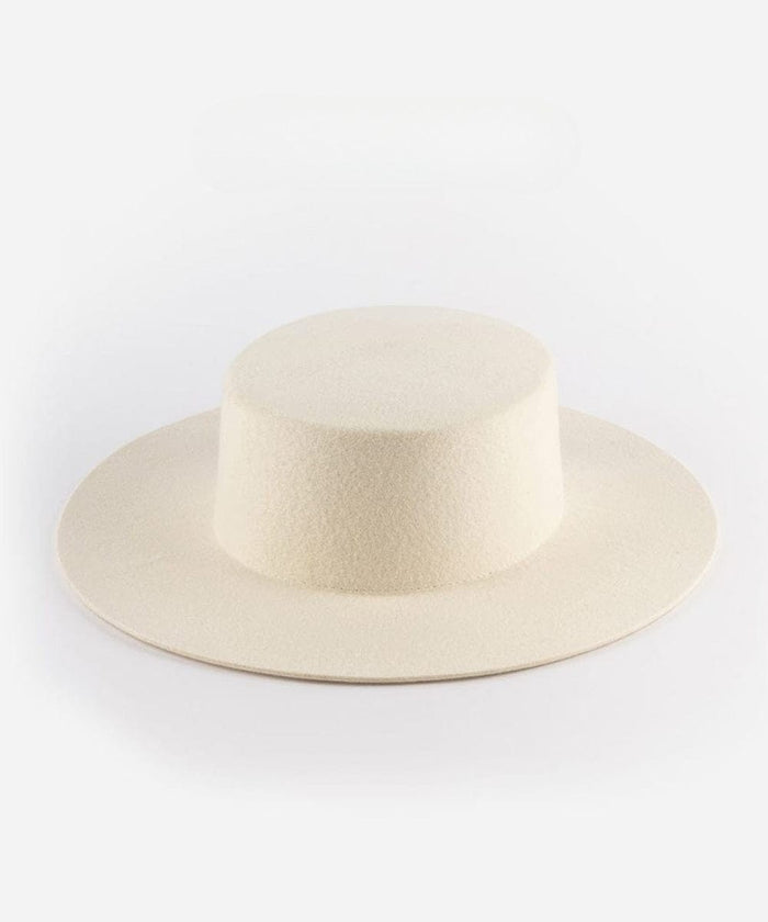 An off white boater-style hat on a plain background #color_off white