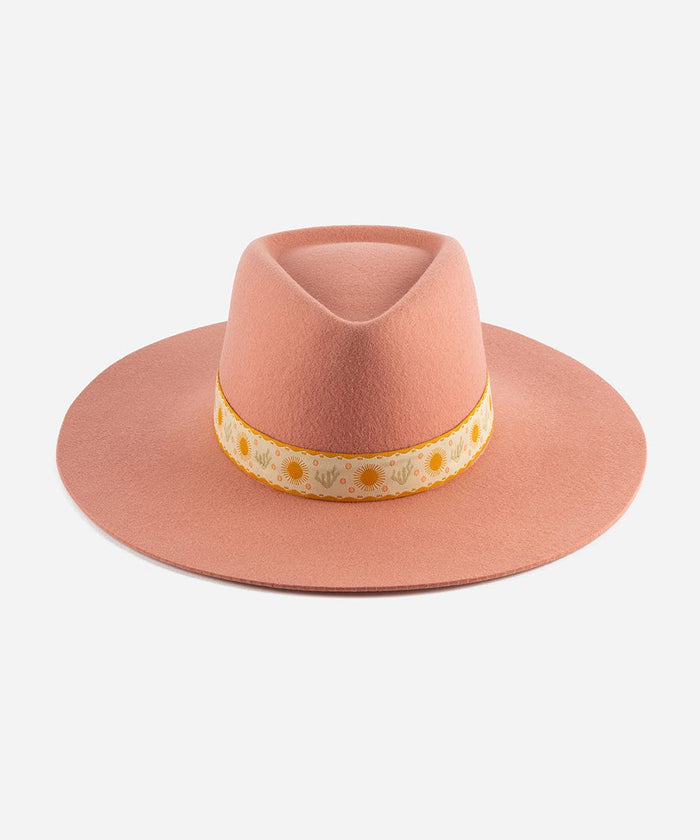 A pink Dakota Dae Triangle Crown hat with a detailed band on a plain background #color_pink