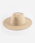 A cream wide brim felt hat with a triangle crown on a plain background #color_cream