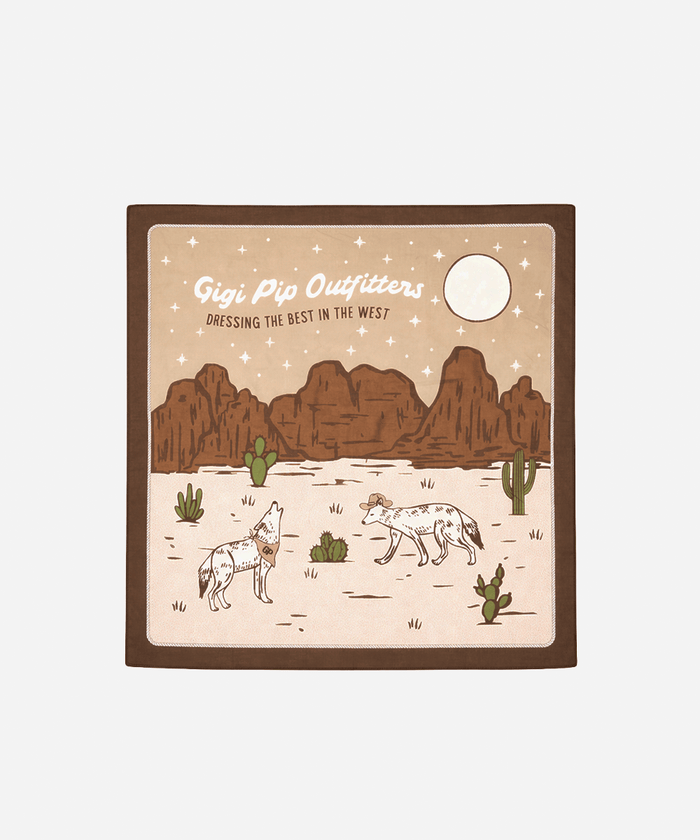 Chocolate colored bandana with a desert scene with mountains, cacti, and two animals with 'Gigi Pip Outfitters' branding on a white background #color_chocolate