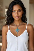 Oversized western turquoise Y-necklace with antique silver floral pendant, bold boho cowgirl statement jewelry for rodeo outfits and country concert styling