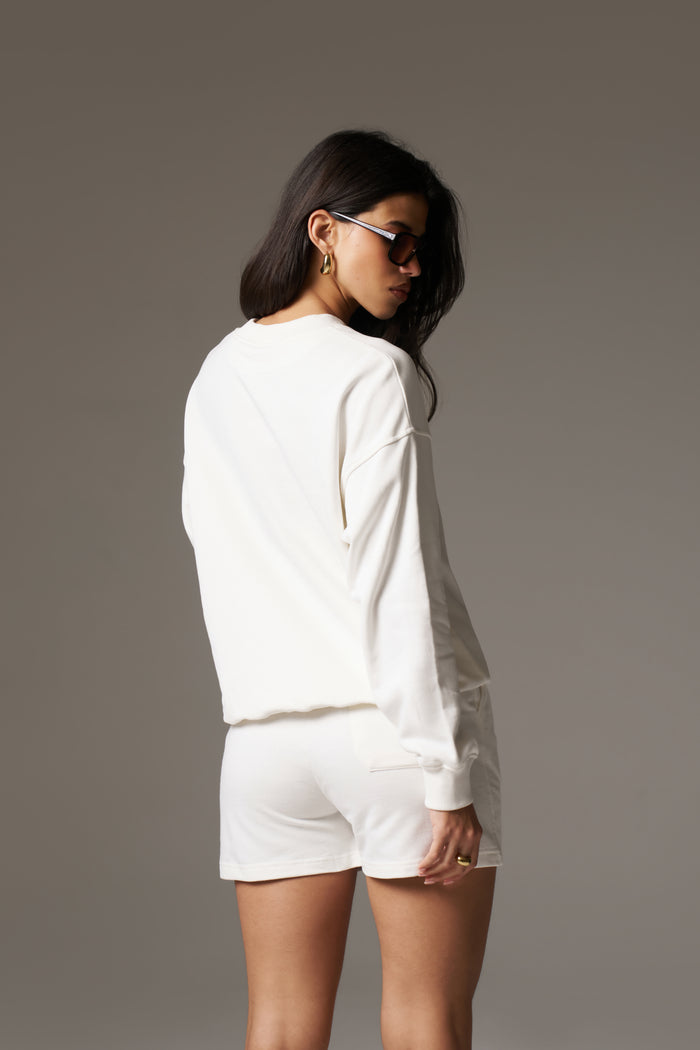 EMBLEM EMBOSSED SHORTS - OFF WHITE