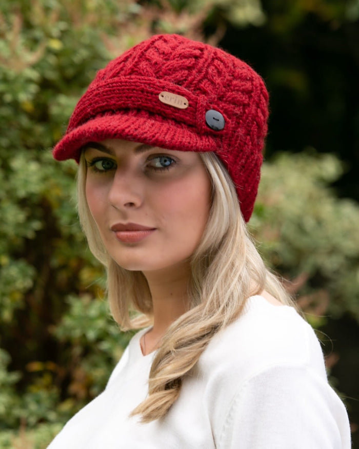 pk927-aran-cable-peak-hat-red-lifestyle-scaled_70860024-6ad4-4411-bc04-e8d4de632268.jpg