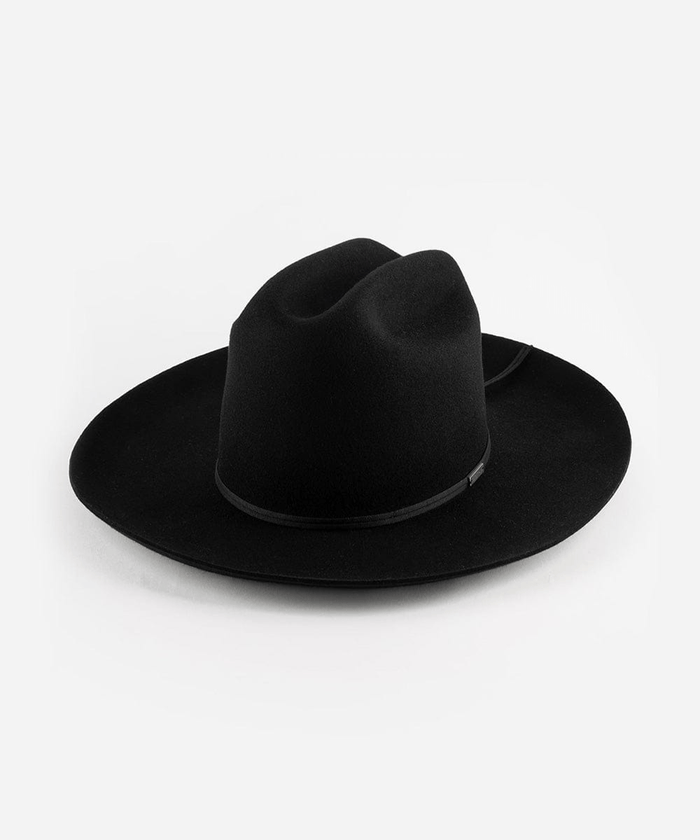 A black Western hat with a classic cattleman crown and a black hat band on a white background #color_black