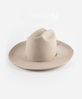 An ivory colored cowboy hat with a hat band on a white background #color_ivory
