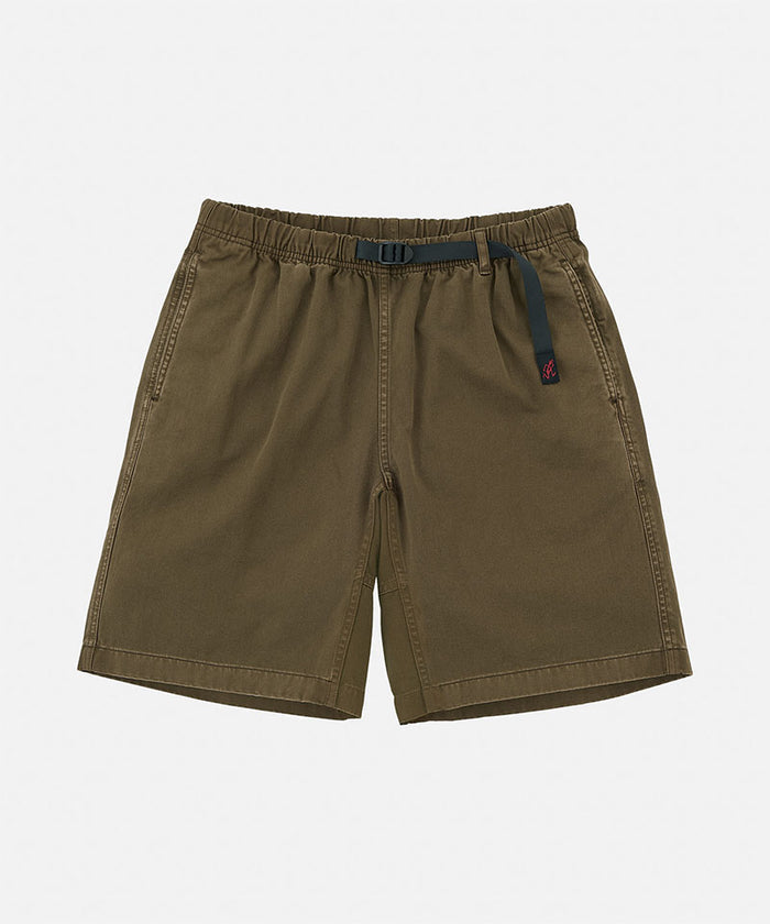 Bark pigment dye Gramicci G-Shorts with a belt against a light-tone background.