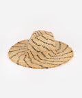A natural colored straw hat with black patterns on a white background #color_natural - black