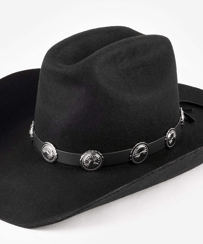 Black cowboy hat with decorative band and conchos on a white background #color_black