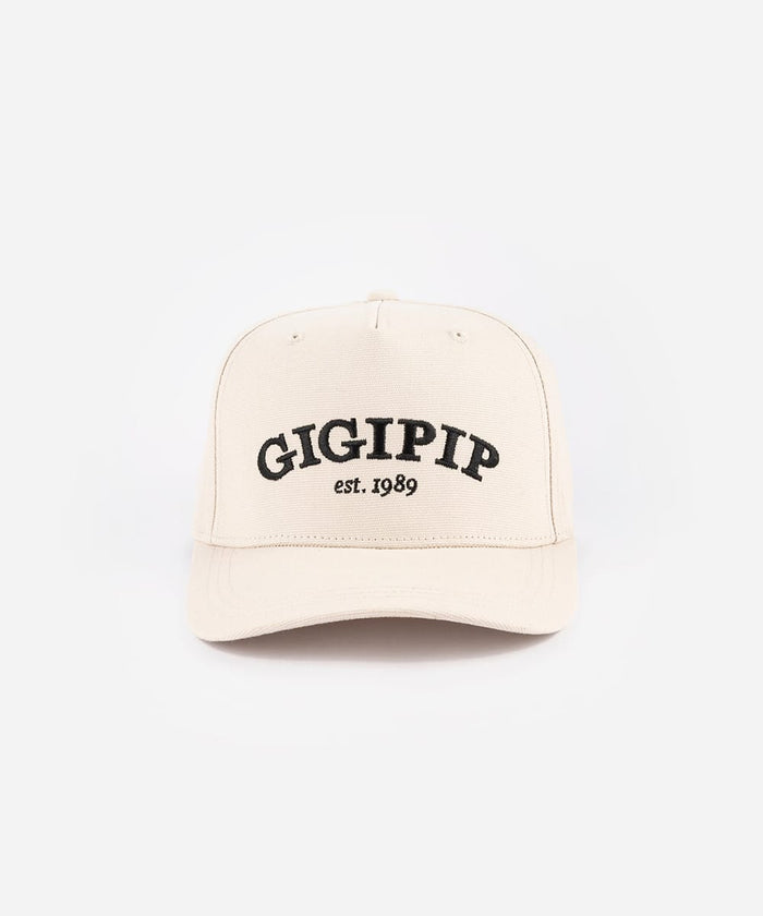 Beige cap with 'GIGIPIP est. 1989' text on a white background #color_cream