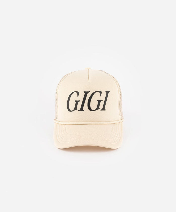 A cream cap with 'GIGI' text on a white background #color_cream