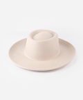 Gambler hat with an indented oval crown and an upturned brim against a white background #color_ivory