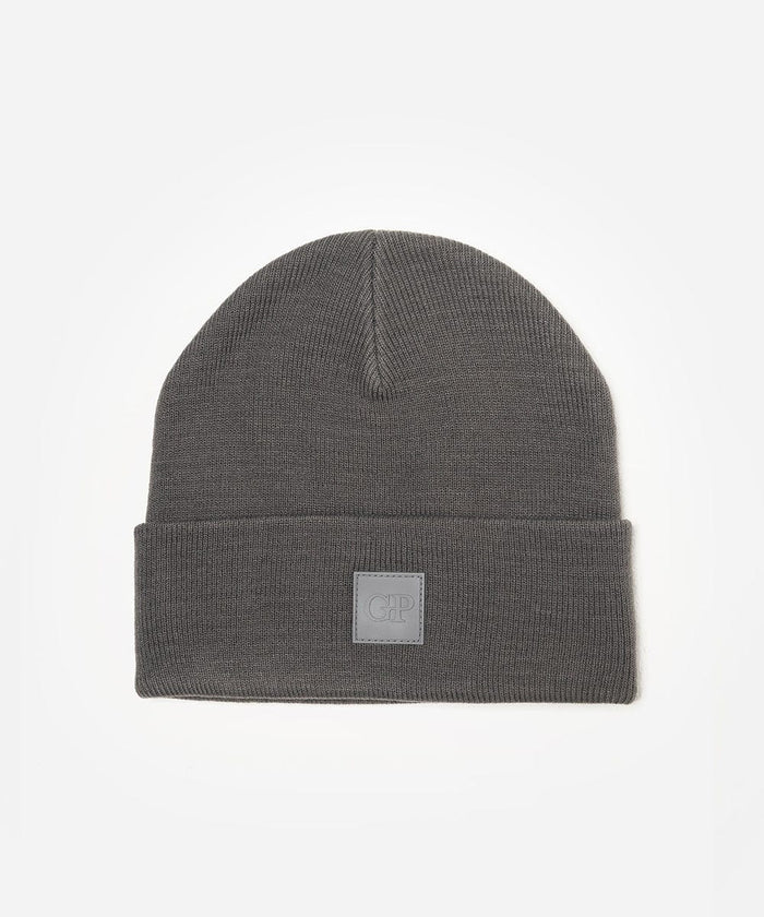 Grey beanie with a brand logo on a white background #color_grey