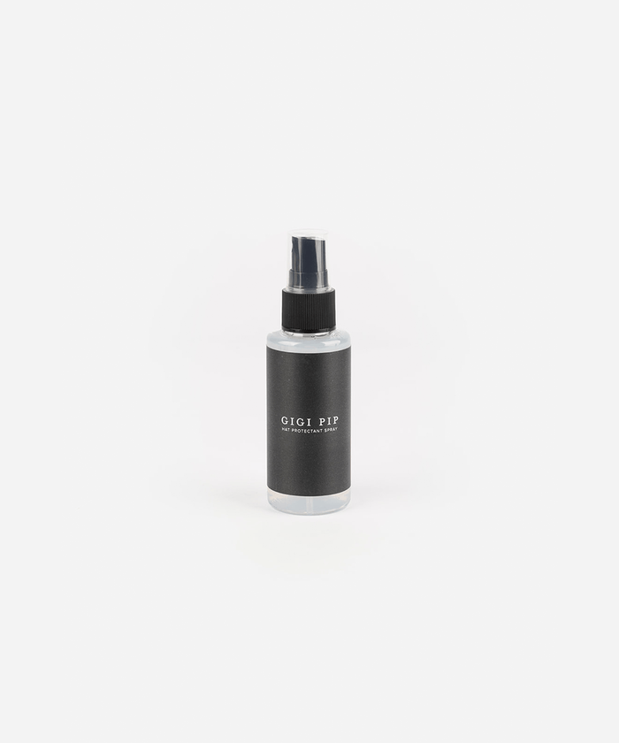 Black hat protectant spray bottle with 'GIGI PIP' branding on a white background